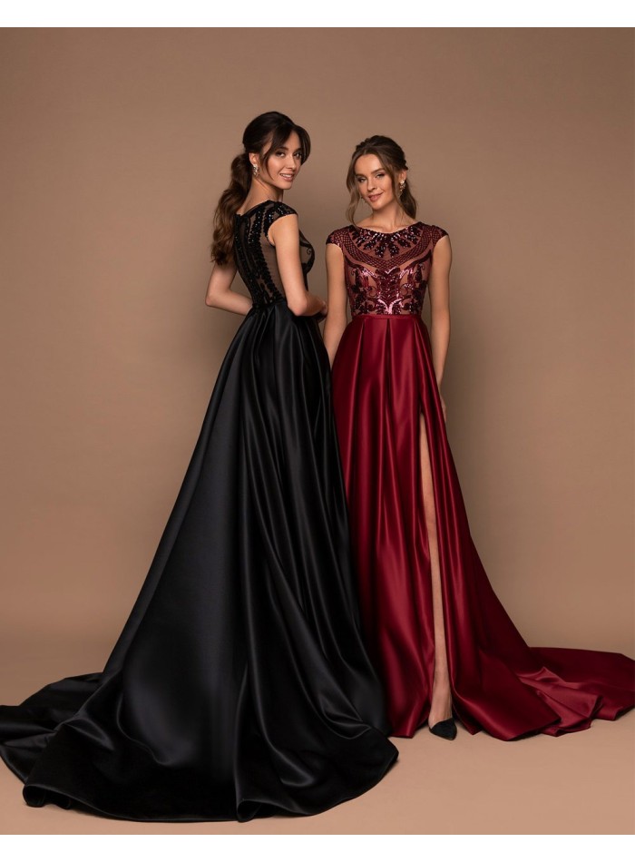 Vestido de fiesta largo con cuerpo de pedrería y falda con vuelo