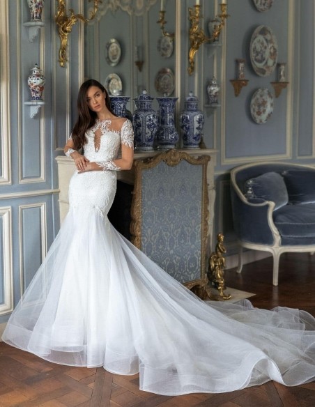 Wedding dress with embroidered tattoo effect sleeves and voluminous tail Wedding dress with embroidered tattoo effect sleeves and voluminous tail
