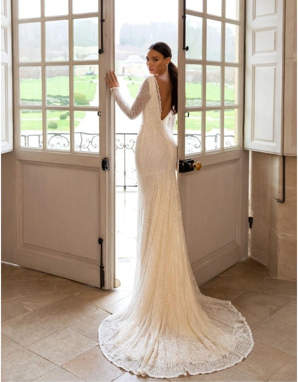 Vestido de novia de manga larga en corte sirena con bordado de pedrería