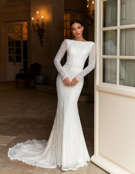 Wedding dress with long sleeves in mermaid cut with rhinestone embroidery from Pollardi Wedding dress with long sleeves in mermaid cut with rhinestone embroidery from Pollardi