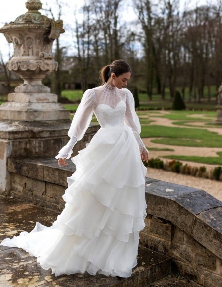 Wedding dress with long sleeves and layered skirt from Pollardi Wedding dress with long sleeves and layered skirt from Pollardi