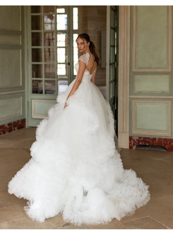 Wedding dress with rhinestone bodice and pompous skirt