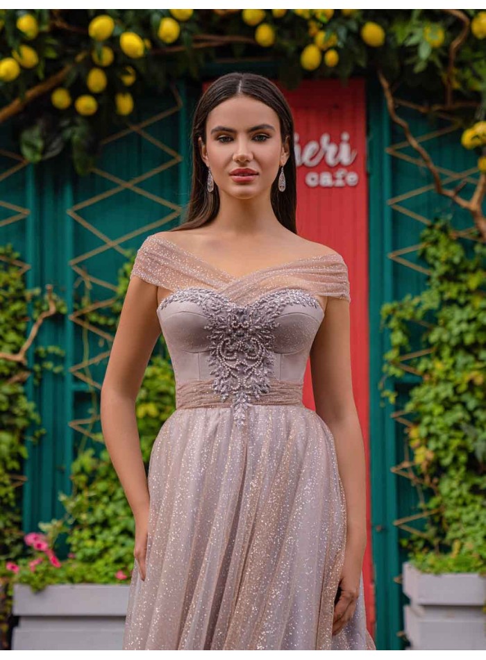 Powder pink long party dress with tulle crossover bandeau neckline at INVITADISIMA
