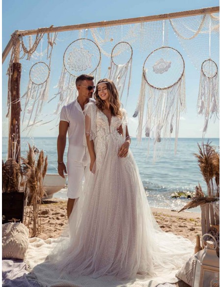 Princess cut wedding dress, lace tulle with rhinestones and open back at INVITADISIMA Princess cut wedding dress, lace tulle with rhinestones and open back at INVITADISIMA