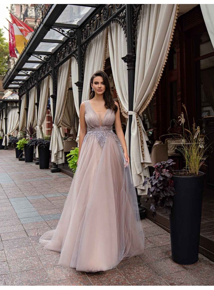 Powder pink evening dress with pleated tulle and rhinestones in the centre for guests