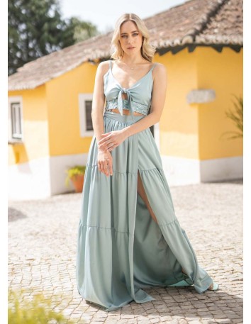 Aqua green high-waisted long skirt with ruffles and side slit for guests
