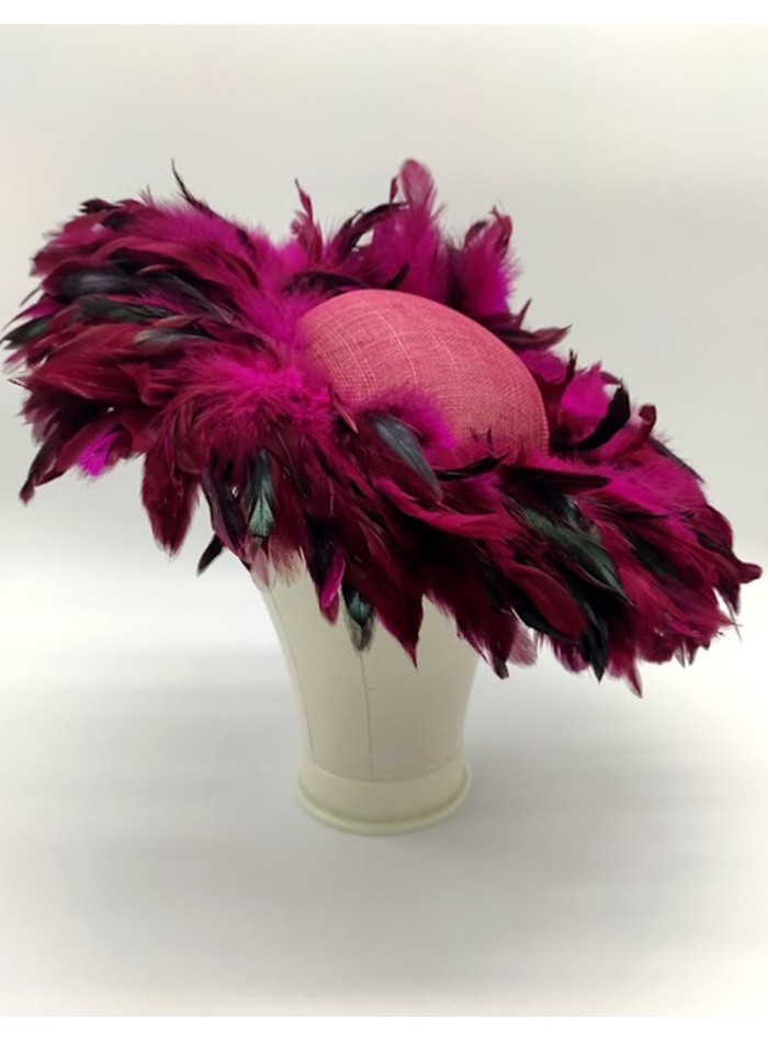 Pamela covered with pheasant feathers in bougainvillea colour