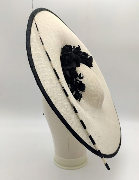 Headdress with a sinamay base decorated with preserved hydrangea branches. Headdress with a sinamay base decorated with preserved hydrangea branches.