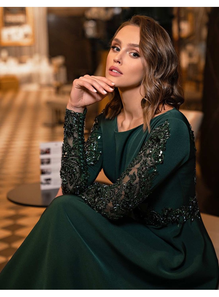 Long party dress with long sleeves and rhinestones in green colour