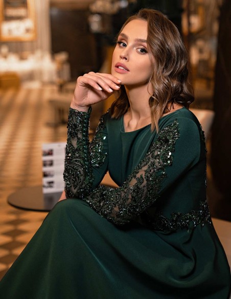 Long party dress with long sleeves and rhinestones in green colour