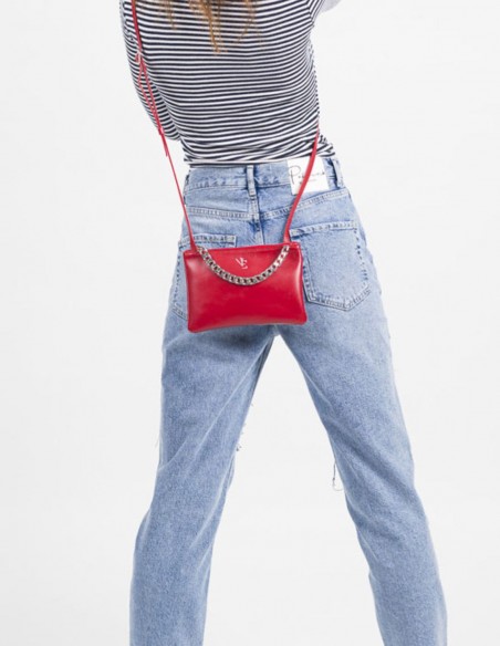 Mini leather bag with decorative chain and adjustable handle