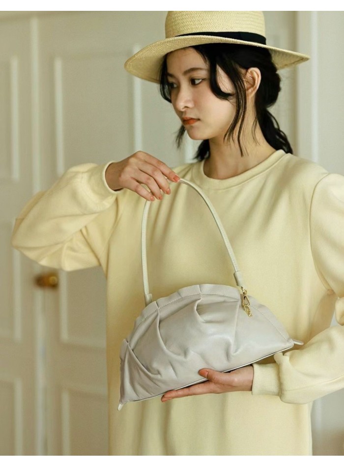 Ivory gyoza-shaped handbag with leather handle