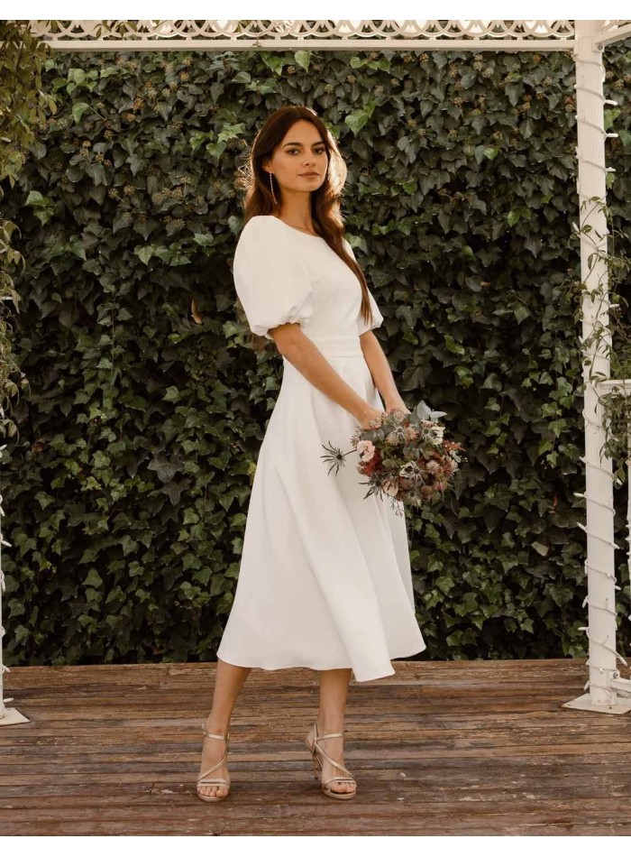 Vestido midi de novia con manga farol