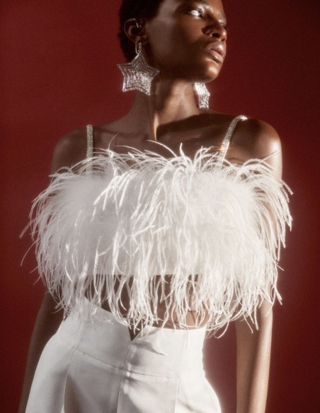 Top de fête avec plumes et bretelles en strass