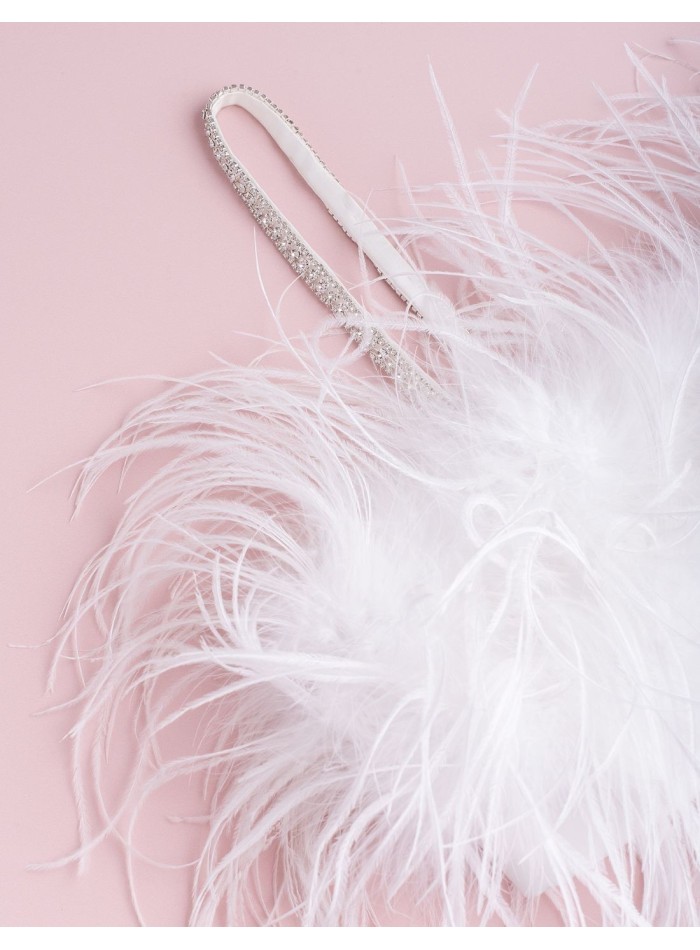 Top de fête avec plumes et bretelles en strass