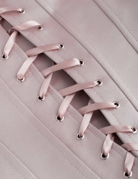 Top de fiesta rosa empolvado con corpiño corazón