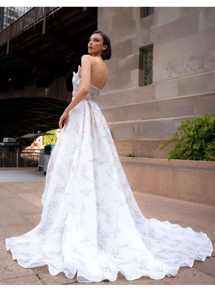 Long party dress with floral print and plunging...