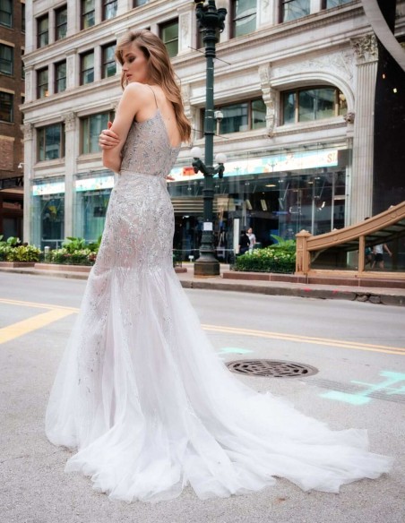 Robe longue de fête à coupe sirène combinée avec des strass et des transparences