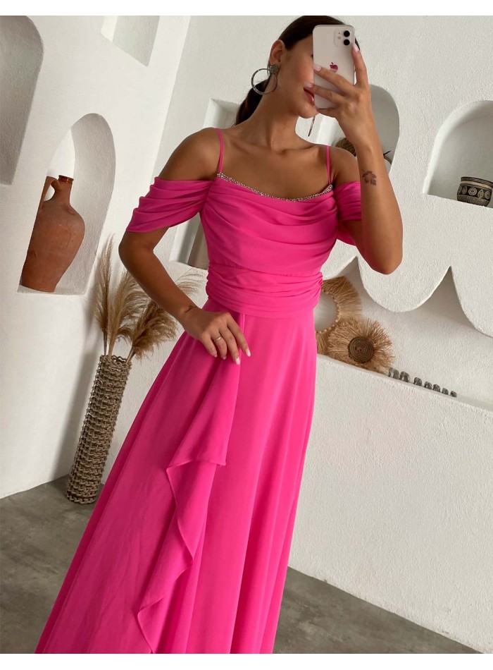 Long flowing evening dress with beaded neckline detail