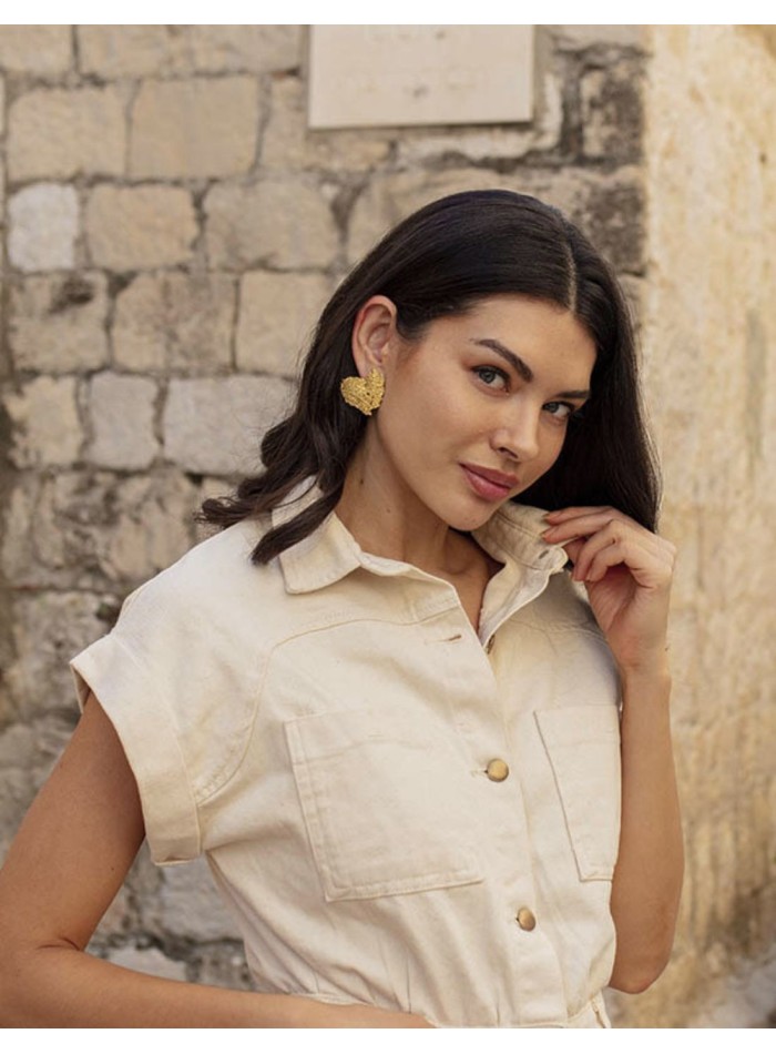 Boucles d'oreilles de fête en or avec relief