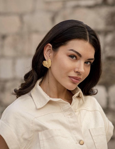 Gold party earrings with relief