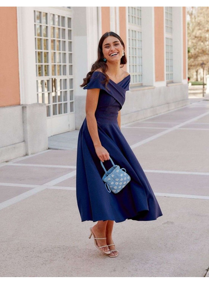 Cocktail dress with crossover neckline and flounced skirt