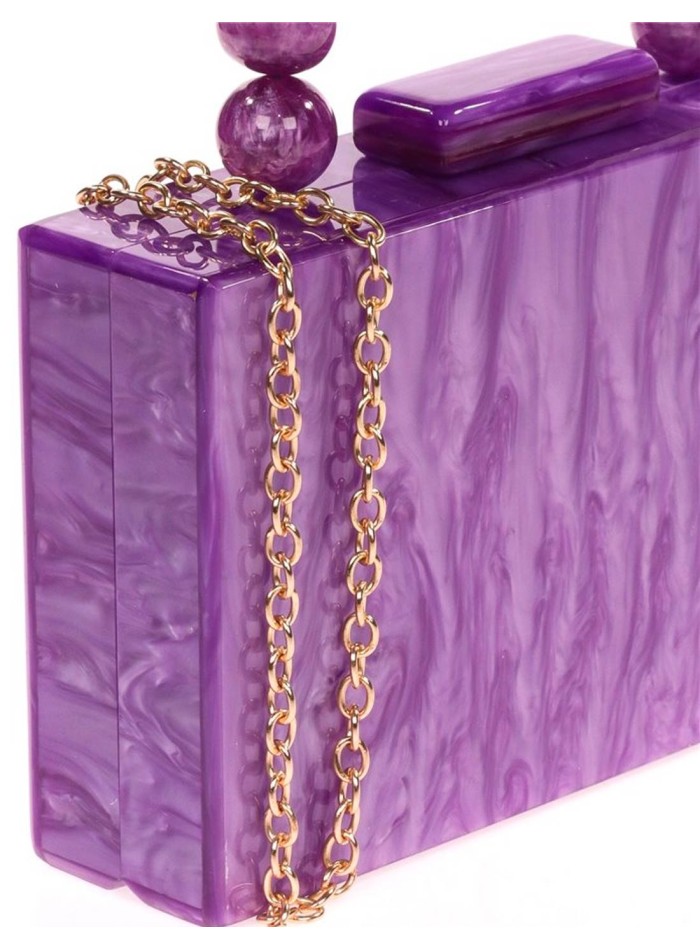 Pearly evening clutch bag with beaded handles