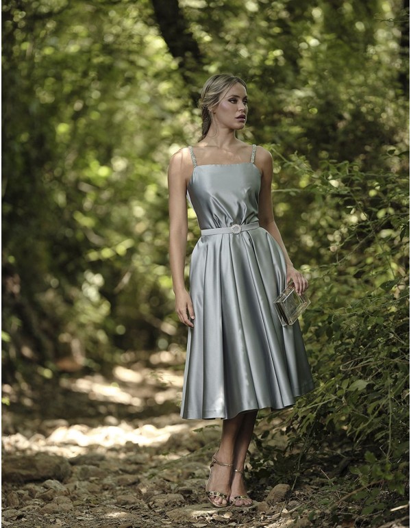 Short ball gown with a slatted skirt and rhinestone straps
