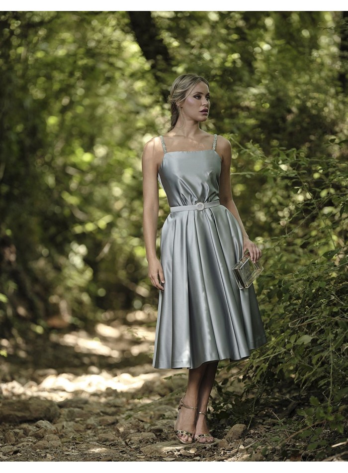 Short ball gown with a slatted skirt and rhinestone straps