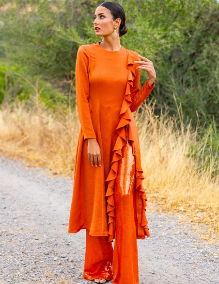 Party outfit with tunic and sequined long pants