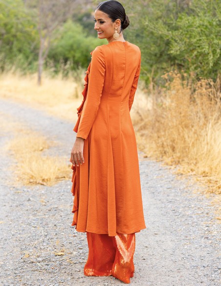 Party outfit with tunic and sequined long pants orange
