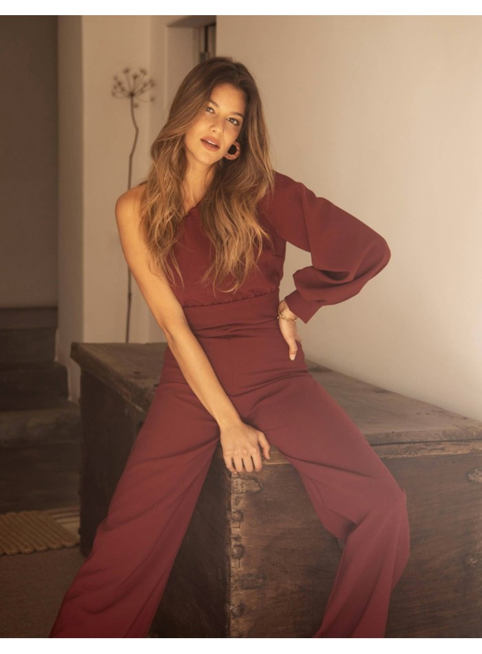 Maroon party jumpsuit with asymmetric neckline and long sleeve