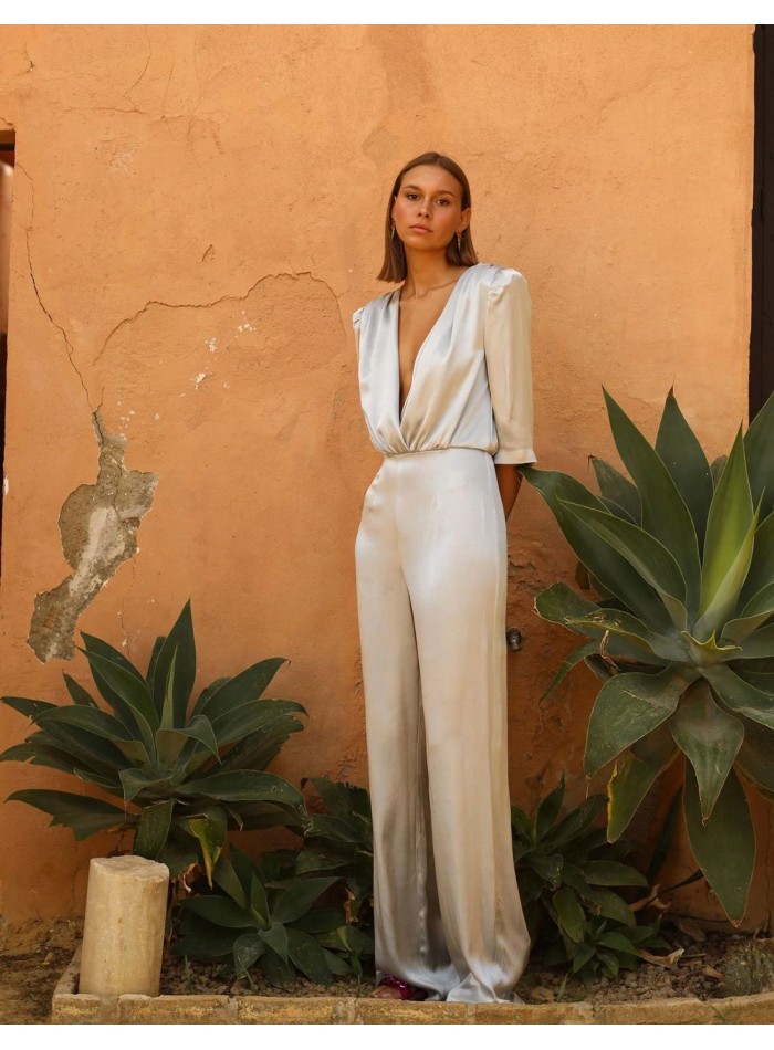 Silver long party jumpsuit with waterfall neckline and tear-drop back