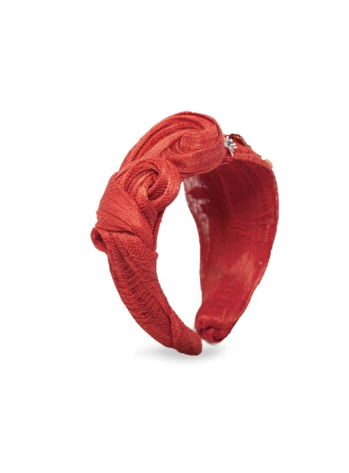 Bandeau noué avec des ornements et des pistils...