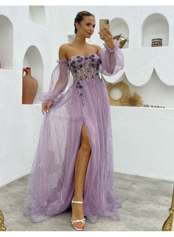 Robe longue de fête avec encolure cache-coeur combinée à des transparences et des strass