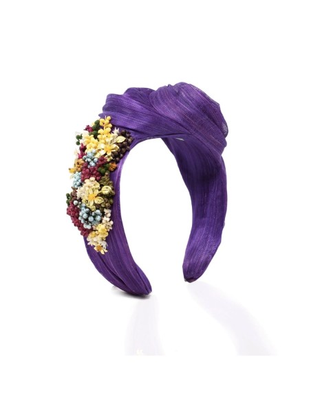 Purple knotted headband with preserved flowers