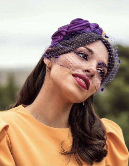 Purple knotted headband with preserved flowers