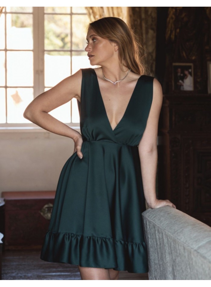 Emerald green short dress with a plunging neckline