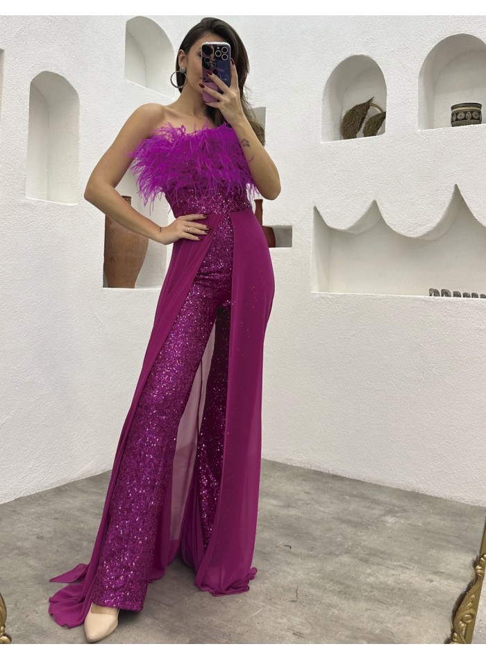 Evening jumpsuit with feather neckline made of sequins and cape skirt