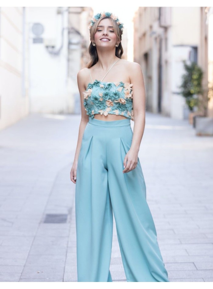 Blue-green palazzo pants with extra volume.