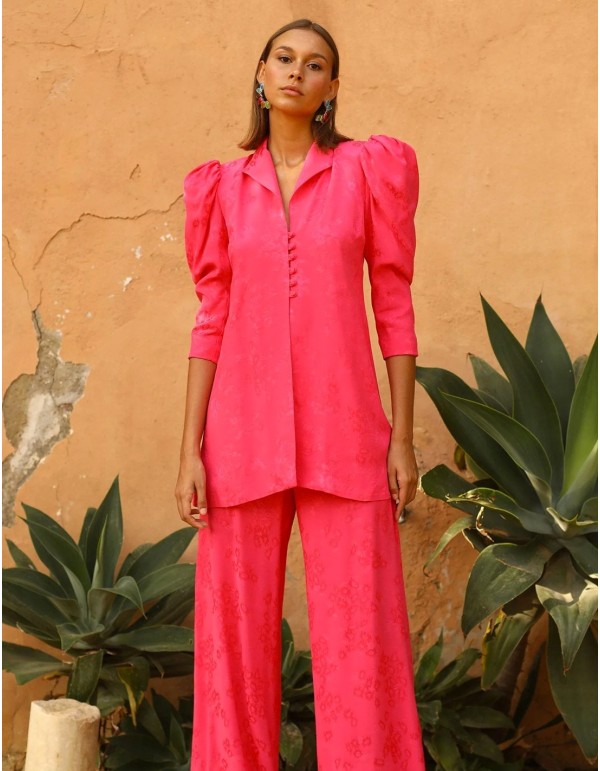 Traje de chaqueta con tejido fluido y pantalón palazzo