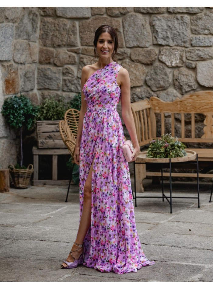 Long dress with floral print and asymmetrical neckline.