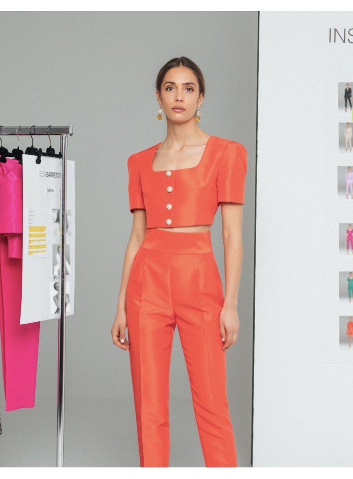 Orange long trousers with darts and pockets