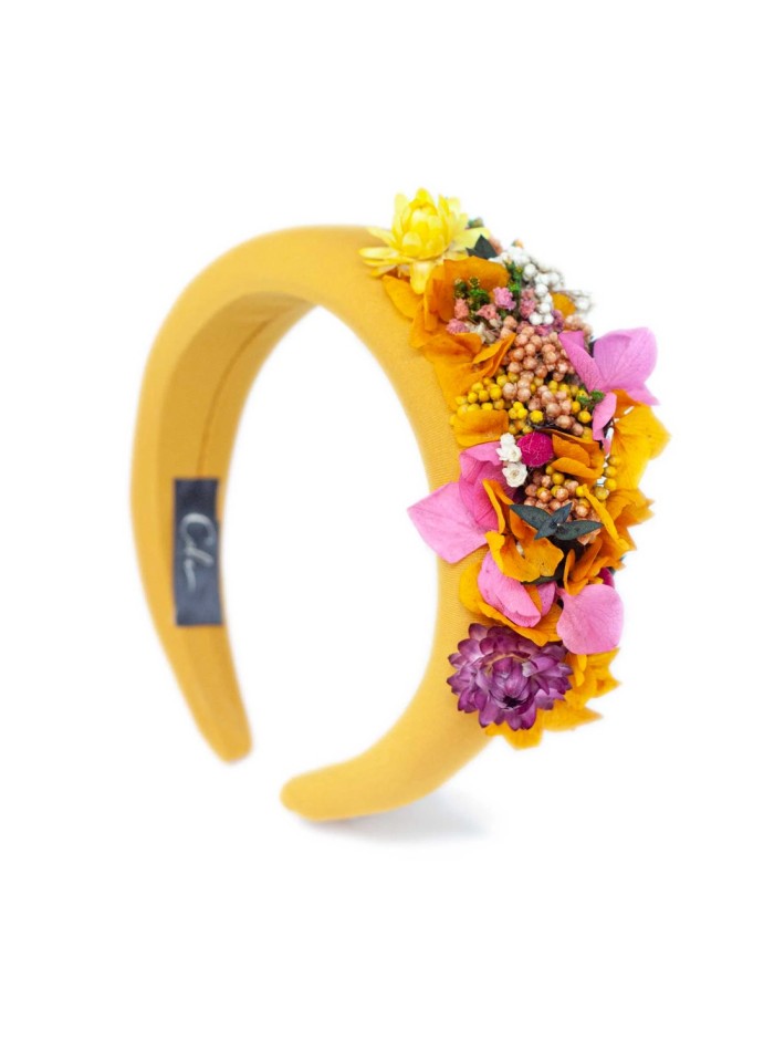 Diadema acolchada para invitada con flores preservadas multicolor