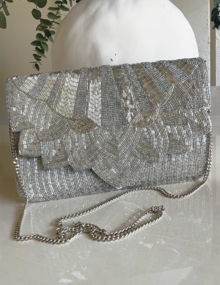 Pochette en strass blanc et argent pour les invités