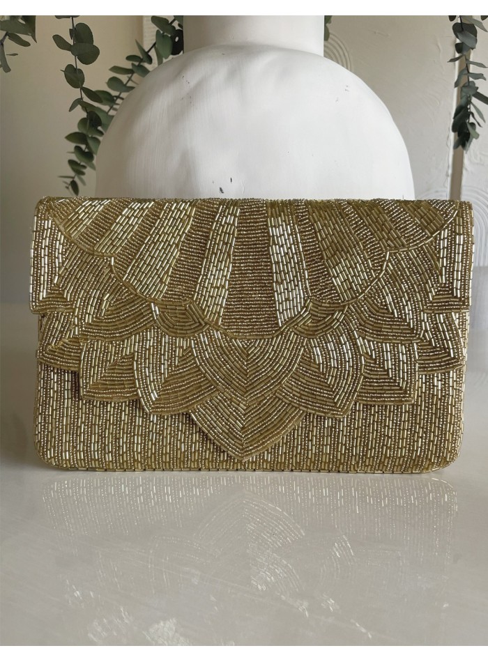 Pochette en strass doré pour les invités