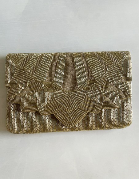 Pochette en strass doré pour les invités