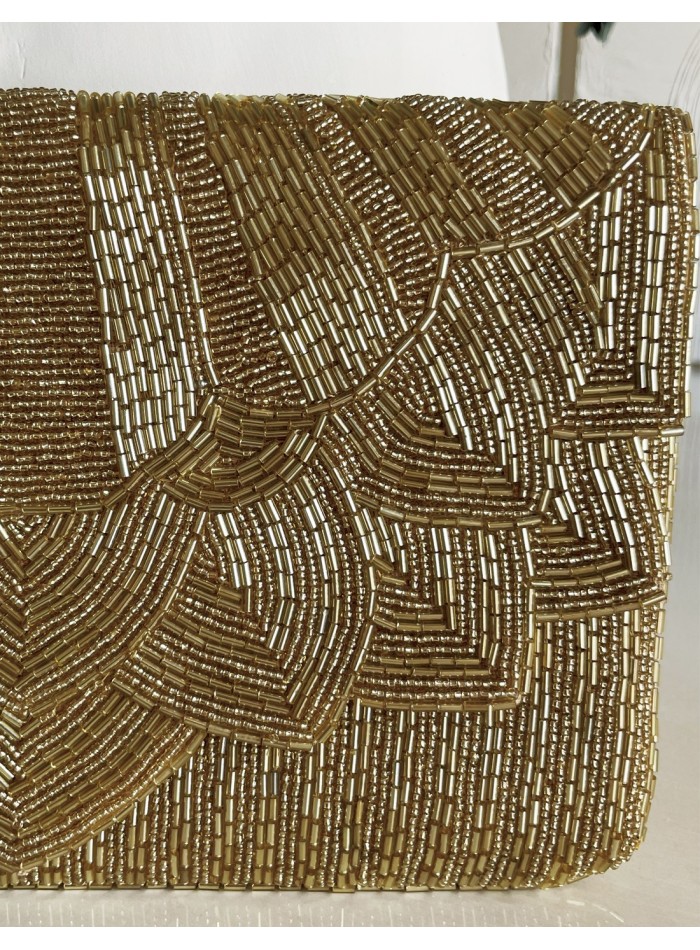 Pochette en strass doré pour les invités