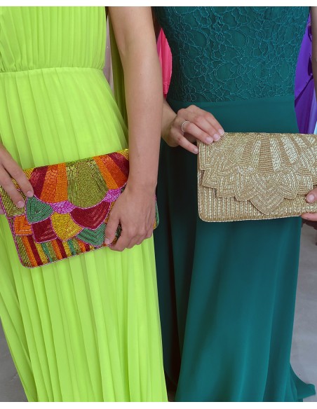 Pochette en strass doré pour les invités