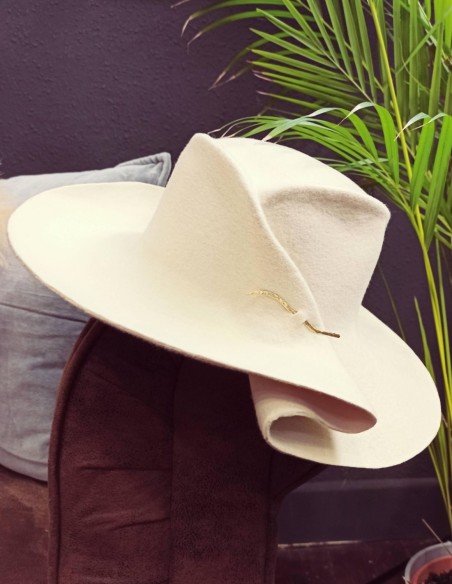 White wool hat with pleat and ruffle. White wool hat with pleat and ruffle.